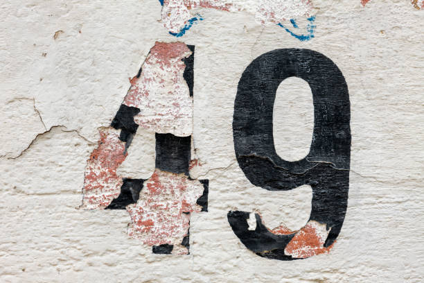 istock Street number sign on the wall 1174895869