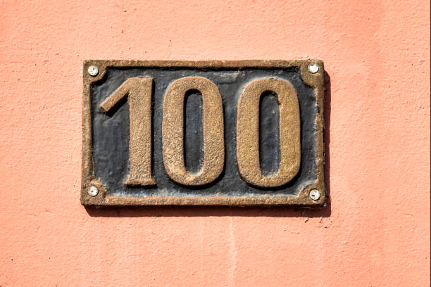 istock Street number sign on the wall 1174896120