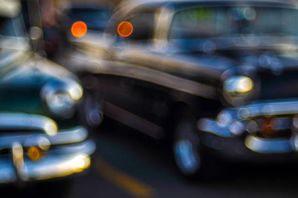 Abstract background with bokeh defocused classic car.