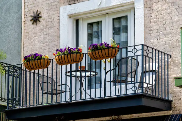 Photo of Mobile, Alabama old town Dauphin street in famous southern town with vintage architecture cast iron balcony