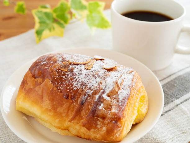 istock Danish pastry and cup of coffee 1174899620