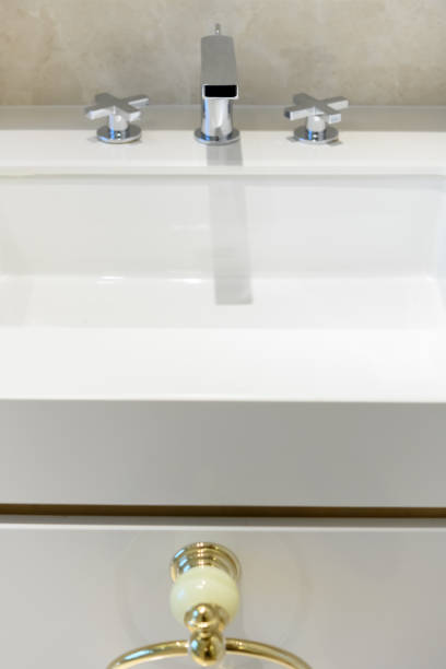 istock white washbasin with chrome faucet vertical composition 1174900297