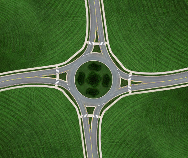 Roundabout Symmetry Aerial drone view of a roundabout. turning photos stock pictures, royalty-free photos & images