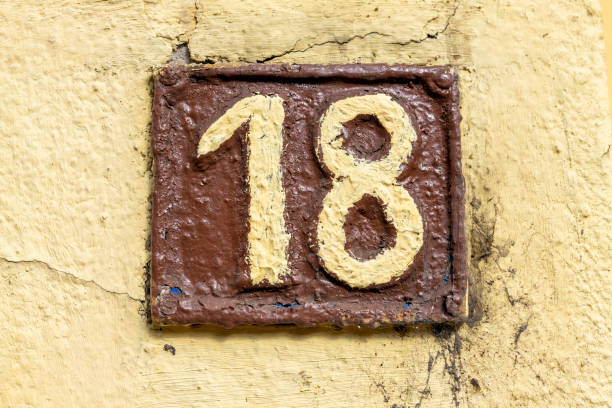 istock Street number sign on the wall 1174901165