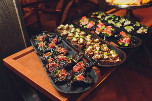 istock crackers with cream cheese and black caviar, horizontal. 1174902625
