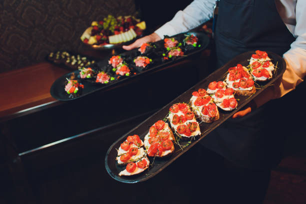 istock crackers with cream cheese and black caviar, horizontal. 1174902631