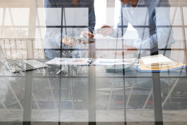istock business people have a meeting. businessman using tablet working with team 1174902900
