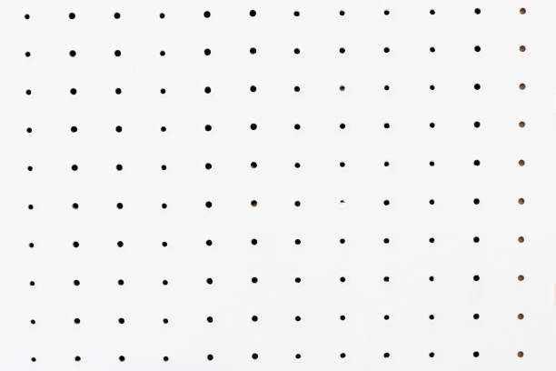 peg board background and texture. white board with holes.