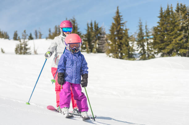 istock Two young skiiers on the slopes 1174914702