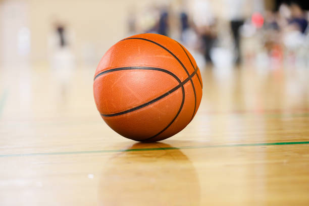 istock Ball placed on gym floor during basketball timeout 1174915713