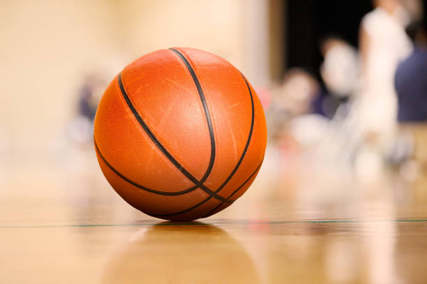 istock Ball placed on gym floor during basketball timeout 1174915722