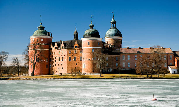 Gripsholm Castle (Mariefred, Sweden) Winter view of Gripsholm Castle with a frozen Lake M&#228;laren in the foreground. mariefred stock pictures, royalty-free photos & images