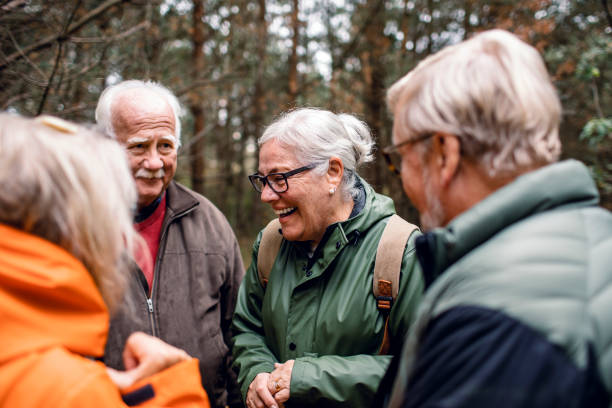 istock Seniors hiking through the foerst 1174919505