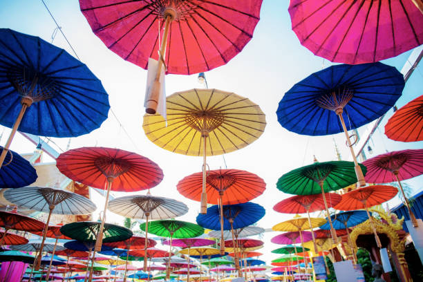 istock Umbrella of colorful with sky. 1174921196
