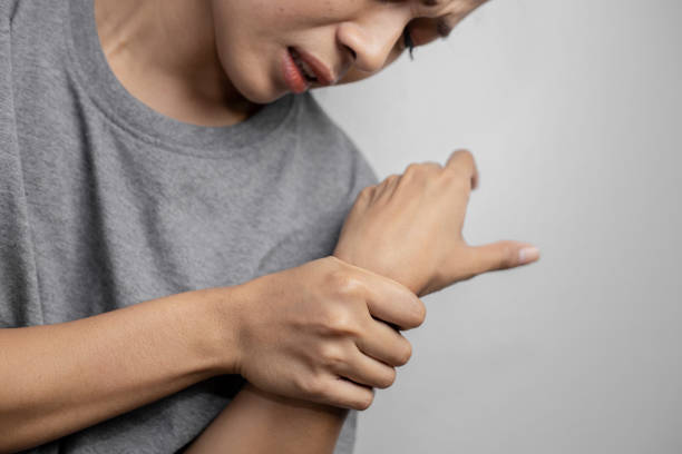 istock Woman suffering from pain in wrist. 1174926282