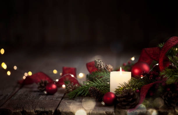 istock Christmas Baubles on and Old Wood Background 1174928270