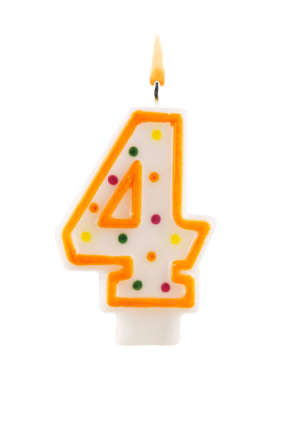 istock Burning birthday candle isolated on white, number 4 1174928454