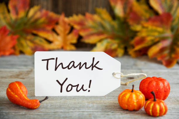 istock Label With Text Thank You, Pumpkin And Leaves 1174929320