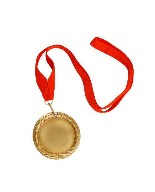 istock Gold medal with red ribbon isolated on white 1174930260