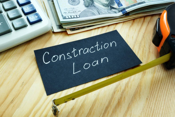 istock Construction loan concept. Measuring tape and money. 1174940254