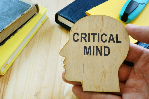 istock Critical mind sign on the wooden haed shape. 1174940260
