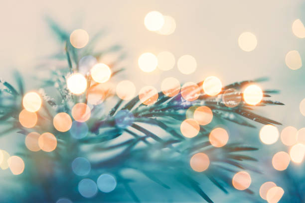 istock Pine tree background for Christmas Decoration with defocused lights 1174944787