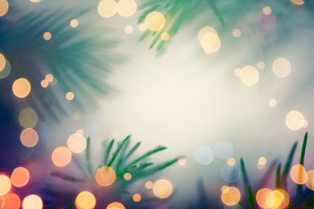istock Pine tree background for Christmas Decoration with defocused lights 1174945288