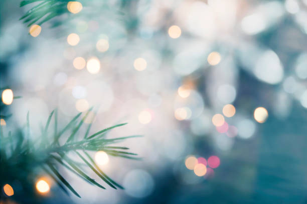 istock Pine tree background for Christmas Decoration with defocused lights 1174946019