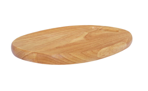 istock Wooden cutting board isolated on white background 1174946322