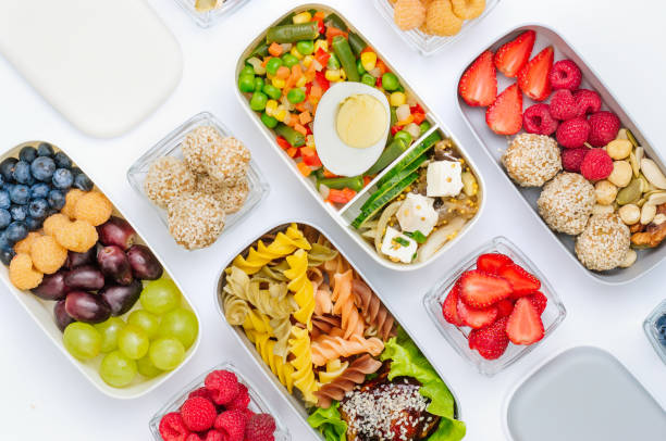 istock Pattern of plastic lunch boxes filled with healthy food 1174949400