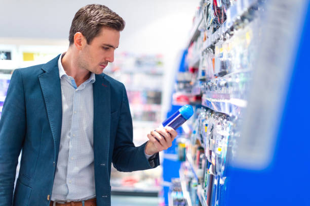 istock Young man holding shaving cream 1174949769
