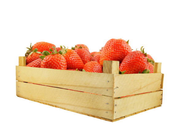 istock Strawberries in wooden box isolated 1174949832
