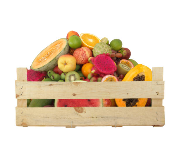 istock Fruits in wooden crate isolated on white 1174950592