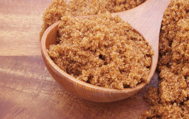 istock Brown sugar with wooden spoon 1174952259