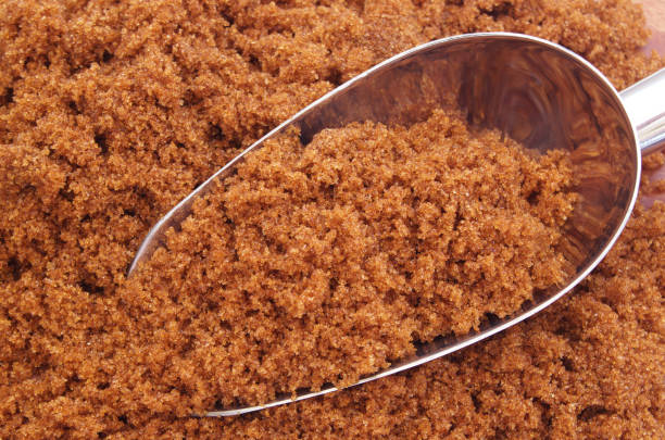 istock Dark brown sugar and metallic scoop 1174952292