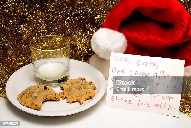 Christmas Cookies And Milk Stock Photo - Download Image Now - Cookie, Santa Claus, Plate