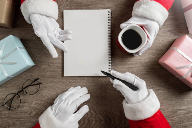 istock Santa clauses are planning and talking for christmas. 1174953954
