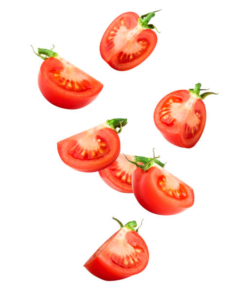 istock Falling tomato isolated on white background, clipping path, full depth of field 1174965253