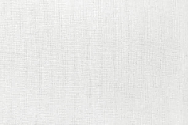 istock White cotton fabric texture background, seamless pattern of natural textile. 1174969444