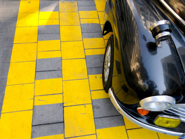 istock Vintage car and no parking zone. 1174972714