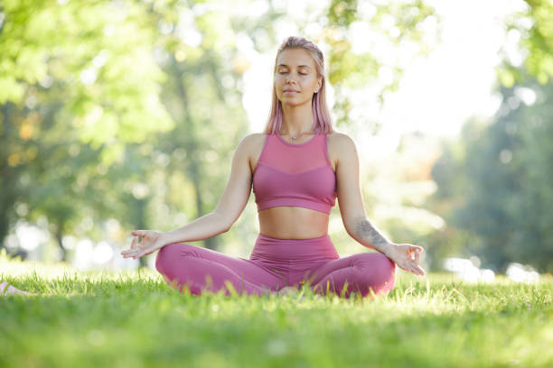 istock Woman doing yoga 1174972850