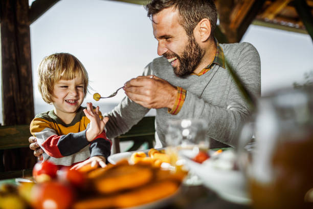 istock No daddy, I don't want to eat that! 1174973684