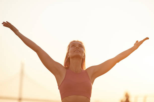 istock Young woman enjoying the nature 1174973834