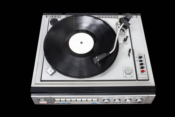 istock Vintage record player with radio tuner on black background 1174974352