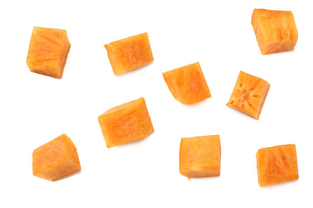 istock fresh ripe persimmon slices isolated on white background. top view 1174974646