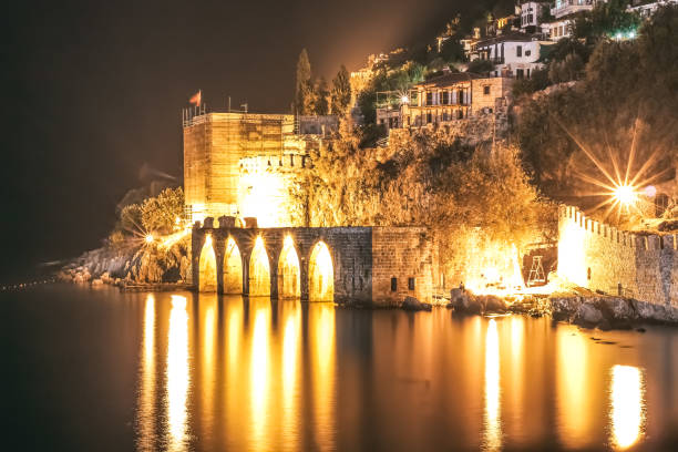 istock Shipyard Alanya Tophane with glowing lights close up 1174979178