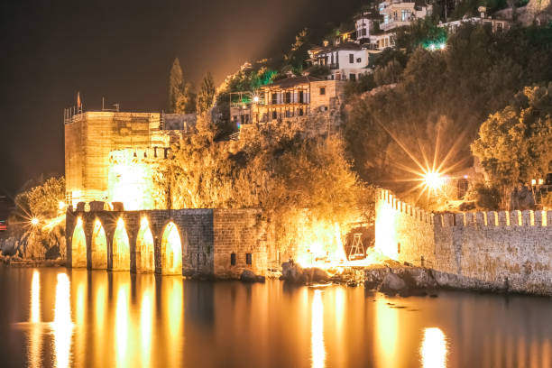 istock Shipyard Alanya Tophane with glowing lights close up 1174979231