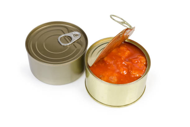 istock One sealed and one open tin cans of canned fish 1174980208