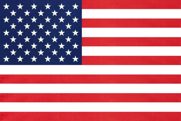 Photo of United states of America national fabric flag textile background. Symbol of international world American country.
