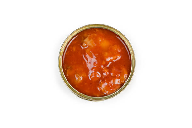 istock Top view of open canned fish in tomato sauce 1174981876
